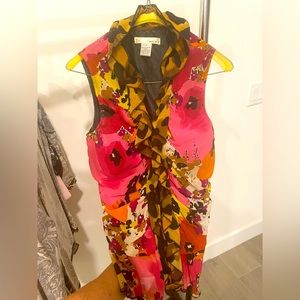 Sleeveless, form fitting, blouse